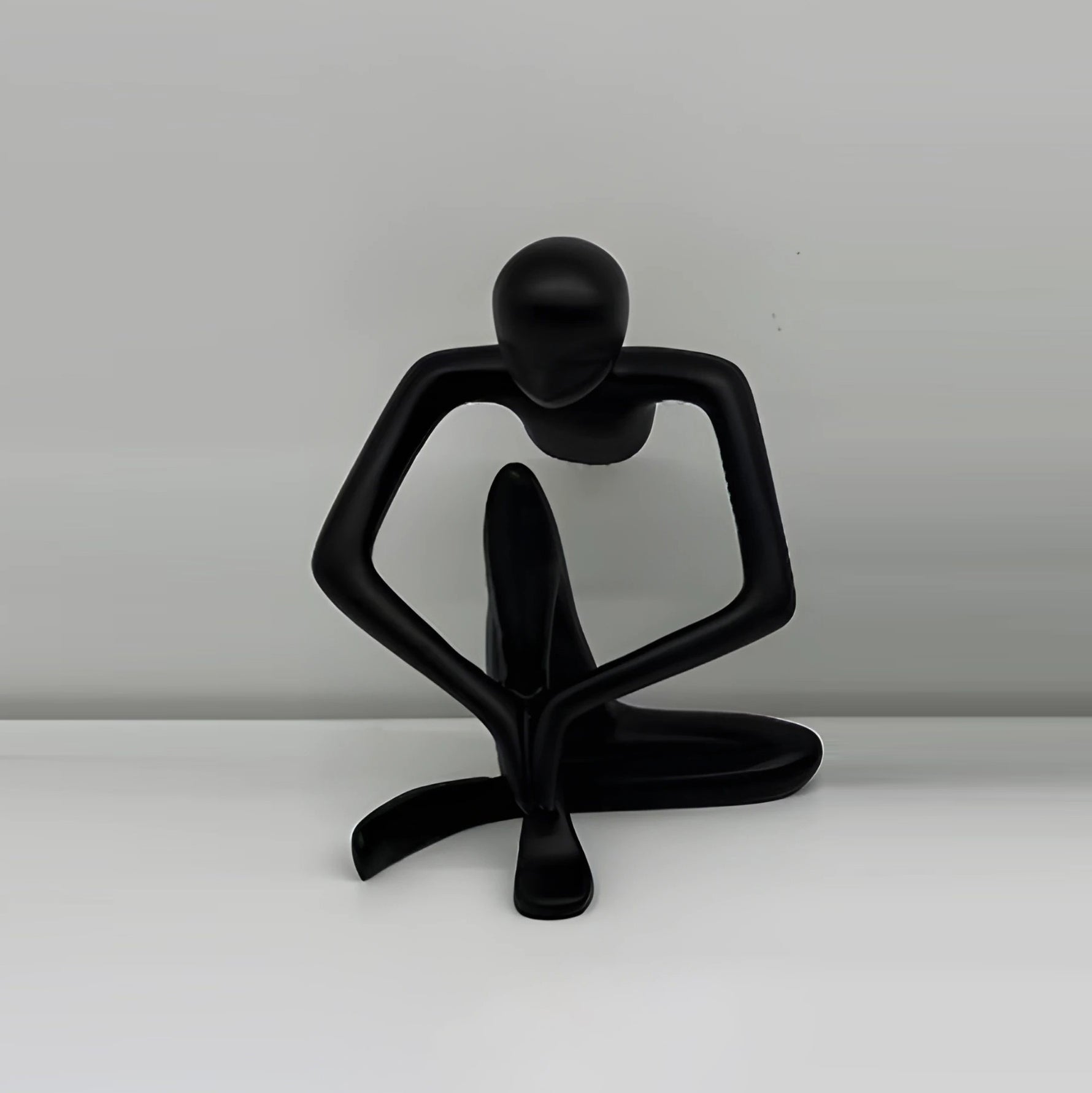 Sitting Figure Sculpture